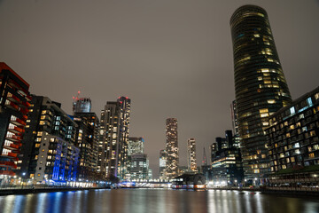 London, United Kingdom - January 26, 2015: View to Canary Wharf across river at night.