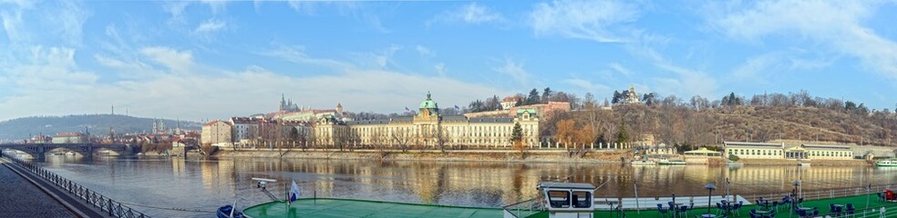 Fototapeta premium Panoramic view towards Kosárkovo embankment in Prague, Czech Republic.