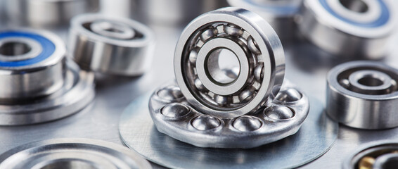 different bearings on a metal background. Part of mechanism.
