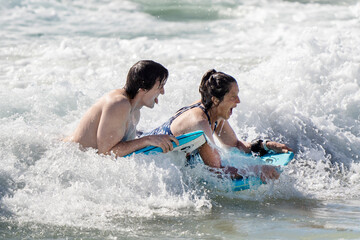 playing in the ocean 