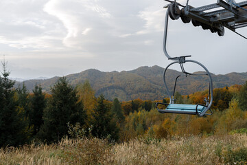 Serene Mountain Landscape with Ski Lift in Autumn