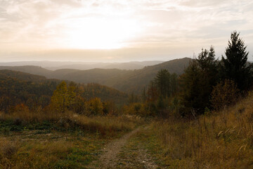 Golden Hour Over Tranquil Mountain Landscape