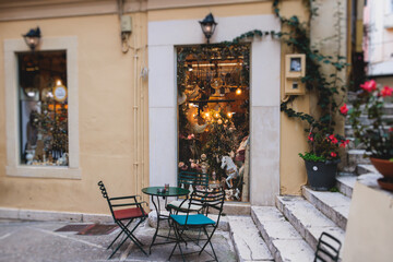 Obraz premium Corfu street view, Kerkyra old town beautiful cityscape, Ionian sea Islands, Greece, a summer sunny day, pedestrian streets with shops and cafes, architecture of historic center, travel to Greece