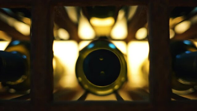 Wine bottles on a shelf in rich restaurant
