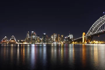 Foto op Canvas Nachtspiegelung von Sydneys skyline  © Johannes