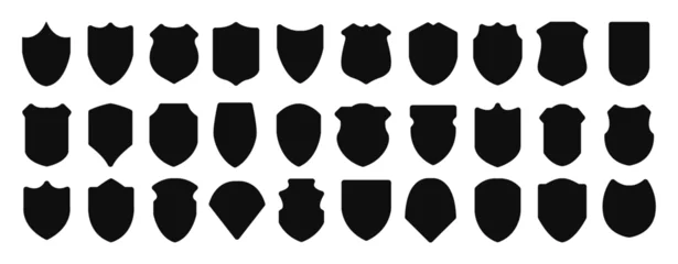 Foto op Canvas Set of silhouette icons of shields. Military shield insignia of different shapes. Vector elements. © Rizal