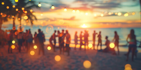 Fototapeta na wymiar Party beach. Blurred people having night beach party in summer vacation