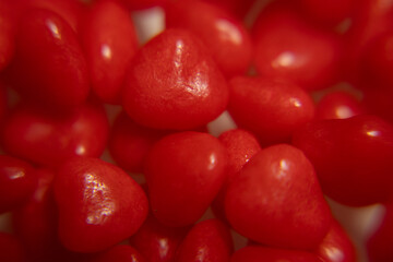 macro of  several litlle hearts on the white table