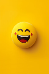 Happy emoji on a yellow background