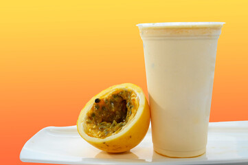 Panoramic still life of colorful frozen fruit granita drinks flowing in plastic takeaway cups with ice cream straws