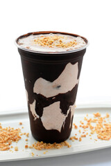 Panoramic still life of colorful frozen fruit granita drinks flowing in plastic takeaway cups with ice cream straws