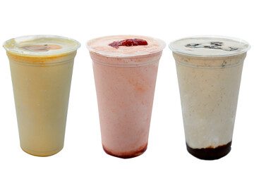 Panoramic still life of colorful frozen fruit granita drinks flowing in plastic takeaway cups with ice cream straws