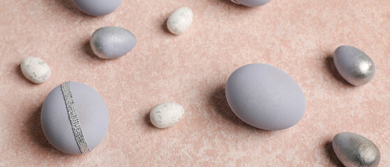 Fototapeta na wymiar Many Easter eggs on beige background