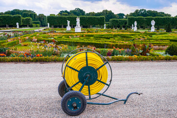 Garden portable watering hose wheelbarrow reel cart for garden grass lawns, flower beds and trees...