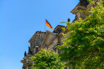 Reichstag building with Germany flag in Berlin