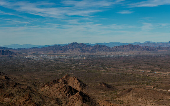 Road going into small city Quartzsite, Az and the mountains and desert