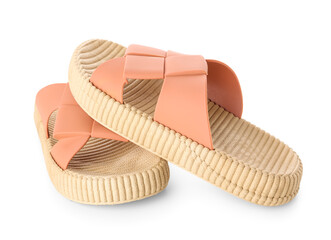 Orange female flip flops on white background