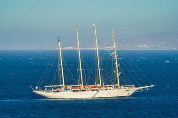 Obraz premium 4 Masts sailboat at the Southern Aegean Sea near Mykonos island. Greece