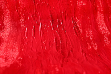 Closeup view of red painted surface as background