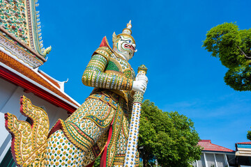 Statues of Giants in gate of temple demon guardians at Wat Arun