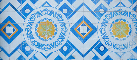 Classical style tiles mosaic in blue, yellow and white with greek inspiration 