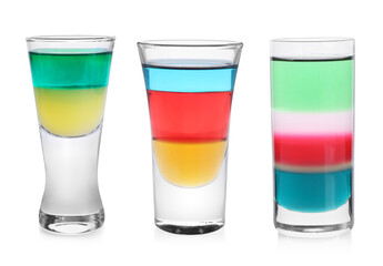 Different shooters in shot glasses isolated on white, set