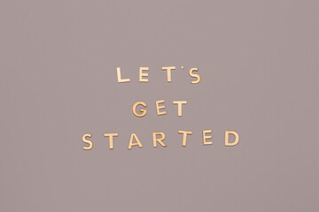 Text LET'S GET STARTED on grey background