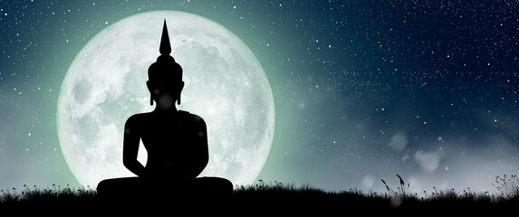 Silhouette of Buddha mediating with Full moon at night. Buddhist holiday Concept.