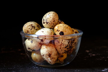 quail eggs in a glass bowl. proteins. allergen.