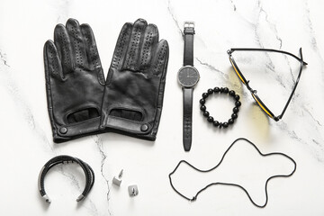 Composition with different male accessories on light background