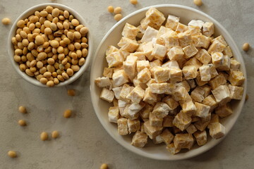 soybeans and diced tempeh. Tempeh or tempe is a superfood made from fermented soybeans. Indonesian food. protein.