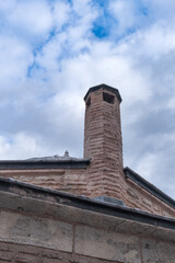 brick chimney. historical building roof.
