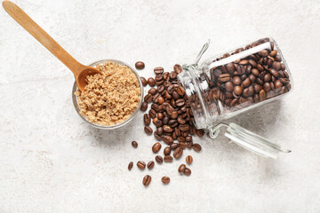 Composition with body scrub and coffee beans on light background