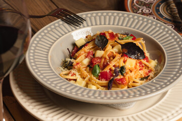 italian pasta with plate and fork