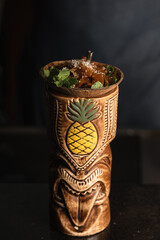 cocktail in tiki mug