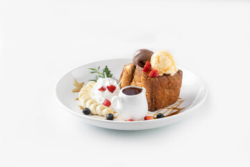 Stock Photo ID: 2362452849
Honey toast on a plate with sweet fruits, blueberries, strawberries and bananas on plate .A delicious dessert with ice cream and toast