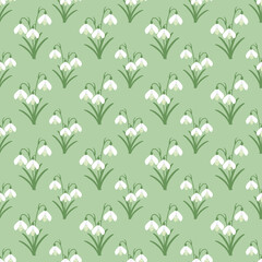 Seamless snowdrop flower pattern on pastel green background. Flat design floral wallpaper illustration.