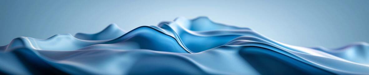 Close-up of soft, silky fabric with smooth waves, creating an abstract blue background with a sense...