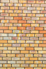 wall made of old yellow bricks as a background 1