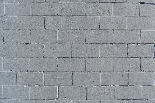 White cinder brick wall.