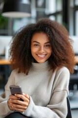 smiling african american woman with smartphone in cafe, communication concept