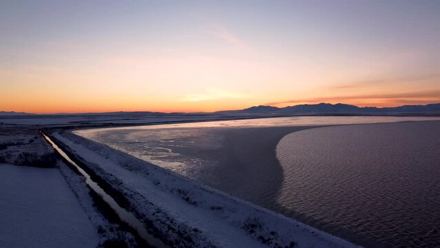 4k Aerial Drone Snow-Capped Mountains Overlooking Willard Bay, Utah