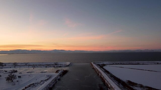 4k Aerial Drone Snow-Capped Mountains Overlooking Willard Bay, Utah