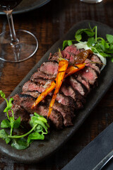 Beef steak and carrots.