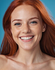 naked body of a girl with a wide smile with veins and red hair on a blue background, toned athletic body