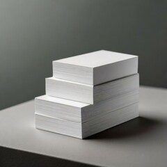 The minimalist design showcases professionalism and attention, business card stack white blank mockup, stack of books on white