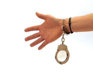 Hand mit Handschellen