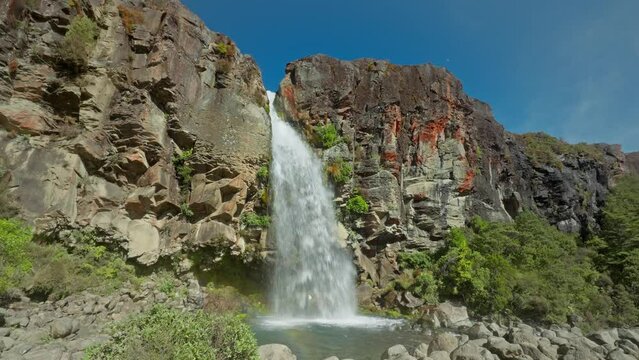 Powerful water dropping from 20 meters off volcanic cliff, Taranaki Falls