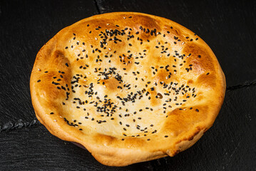 fresh flatbread on the black background