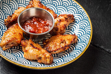 fried chicken with ketchup on plate